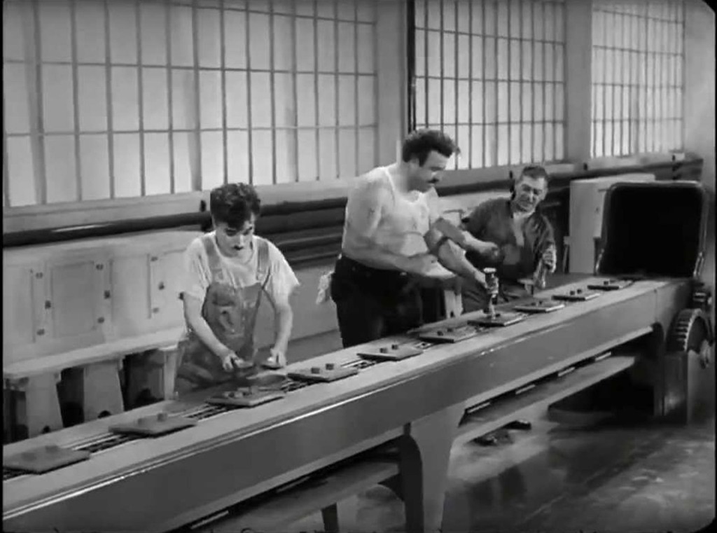 Na linha de montagem, "Tempos Modernos", 1936.